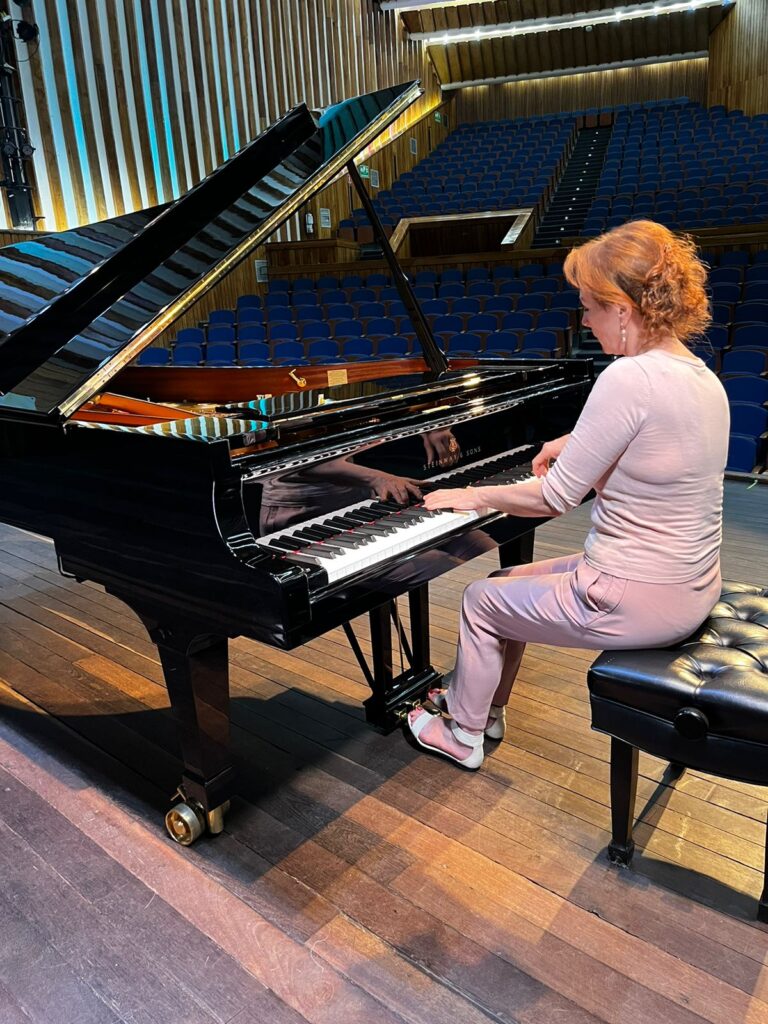 Pianist and composer Mūza Rubackytė during her rehearsal prior to the concert to launch the program of the 39th UIS International Piano Festival.