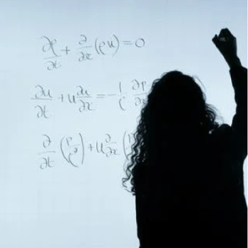 The School of Mathematics UIS presents to the educational community and the general public the research lines of its Difference Equations and Fuzzy Analysis Group (EDAD). Photo taken from the image library showing a woman writing mathematical exercises on a board.
