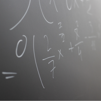 The School of Physics UIS presents to the educational community and the general public the research lines of its group in Relativity and Gravitation (GIRG). Photo taken from stock images showing a blackboard with written equations.